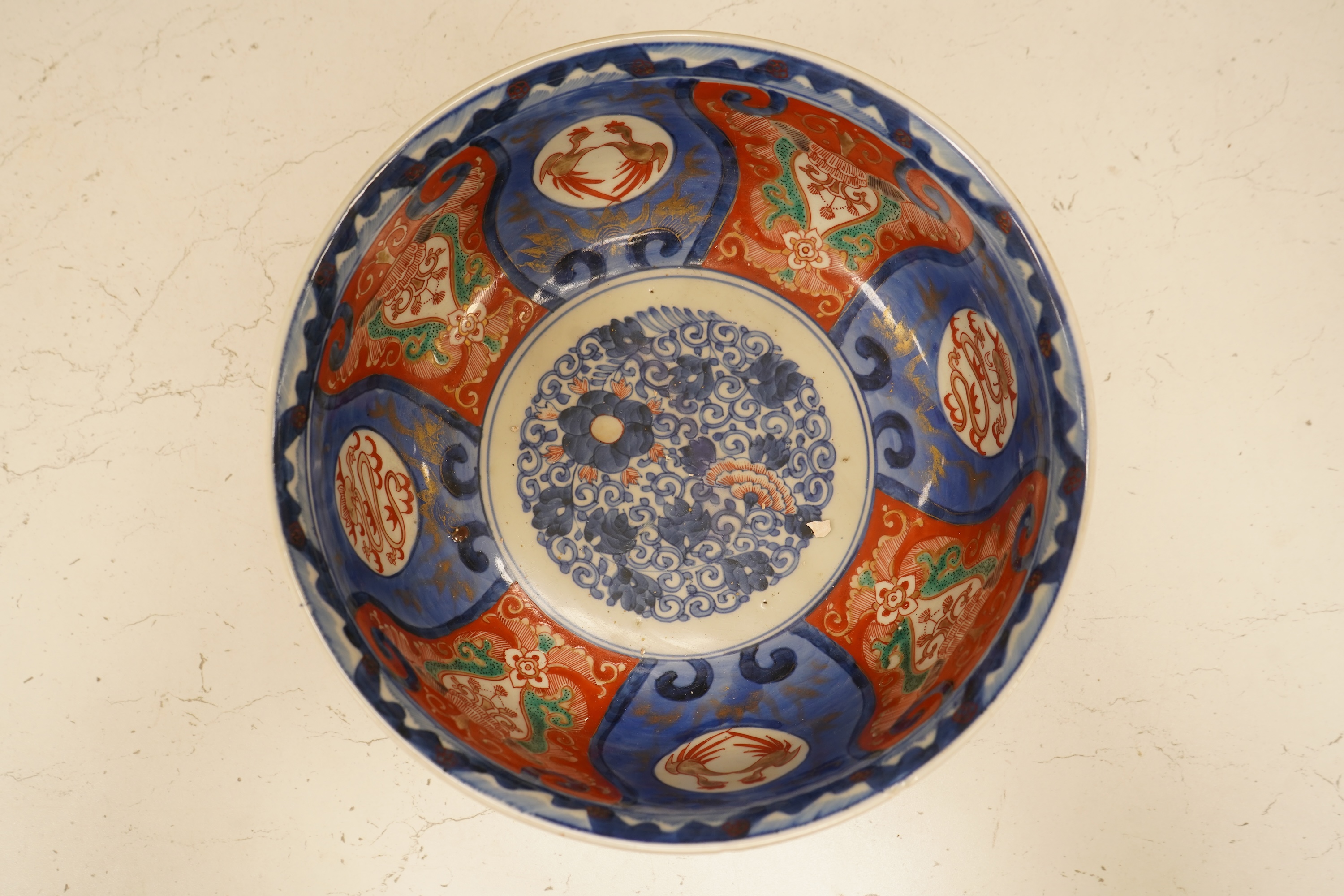 A Japanese Imari bowl and a similar fluted dish, bowl 25cm diameter